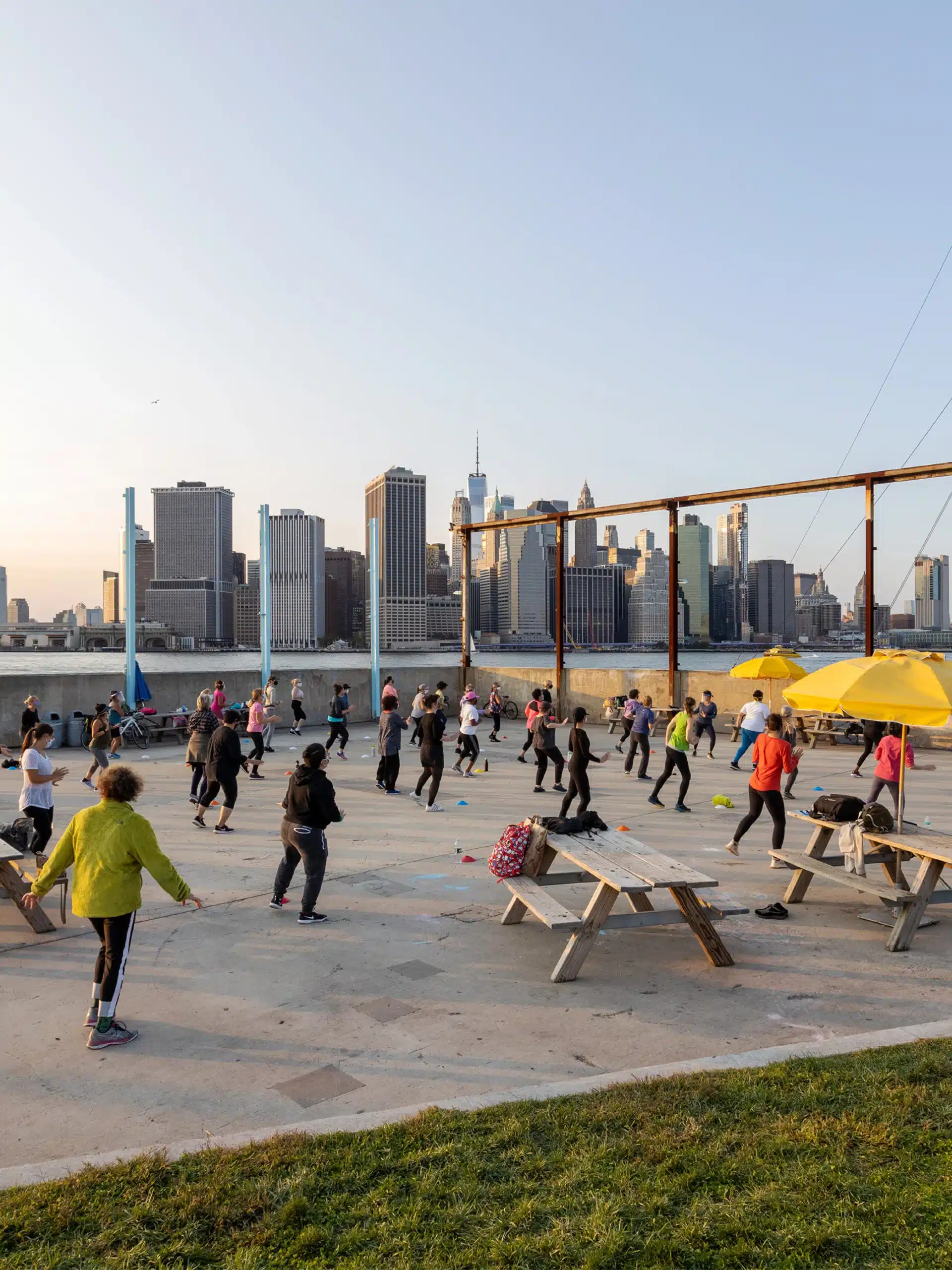 View of group doing zumba on Pier 6 at sunset.