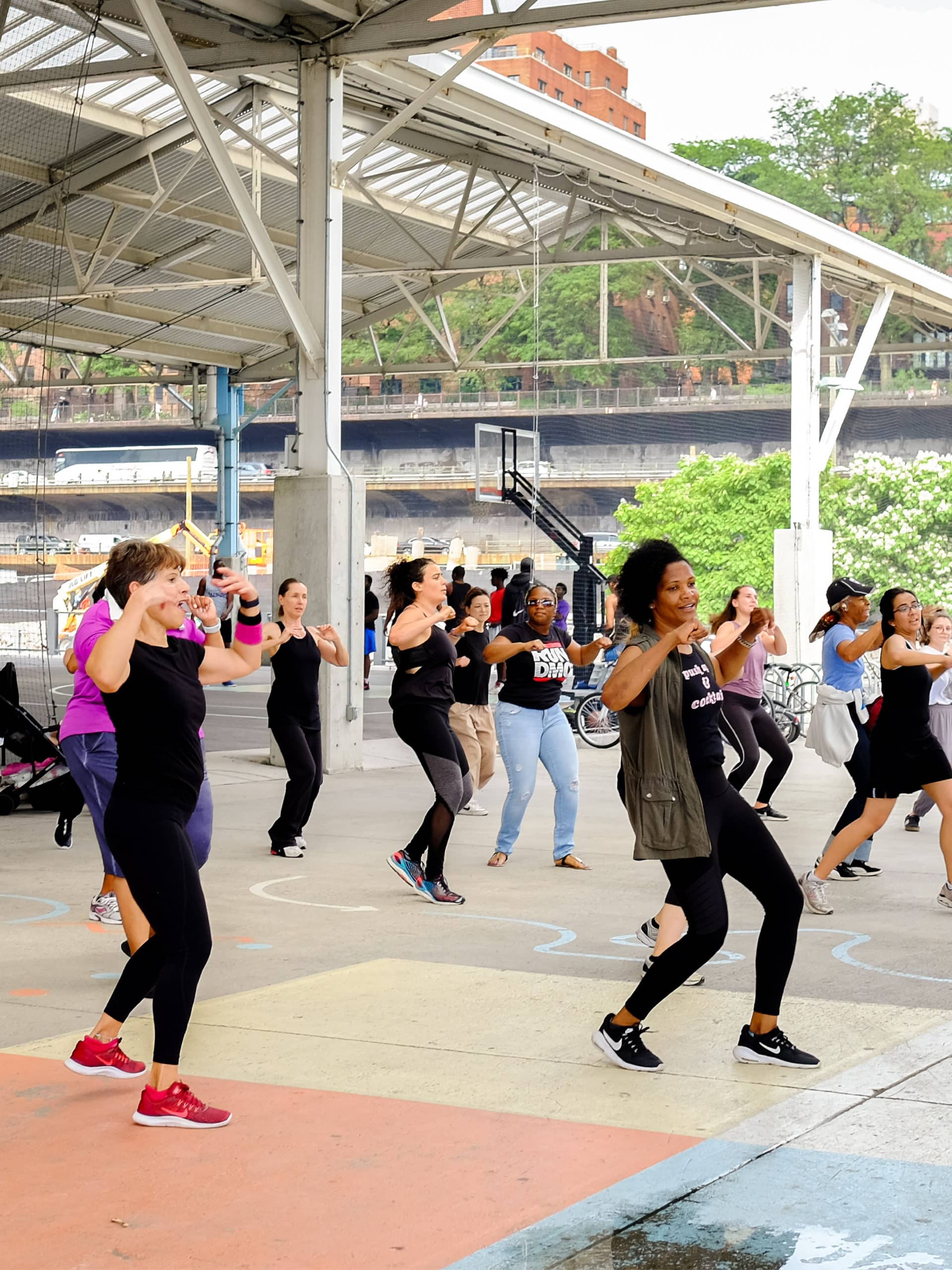 Group doing zumba under the Pier 2 canopy.