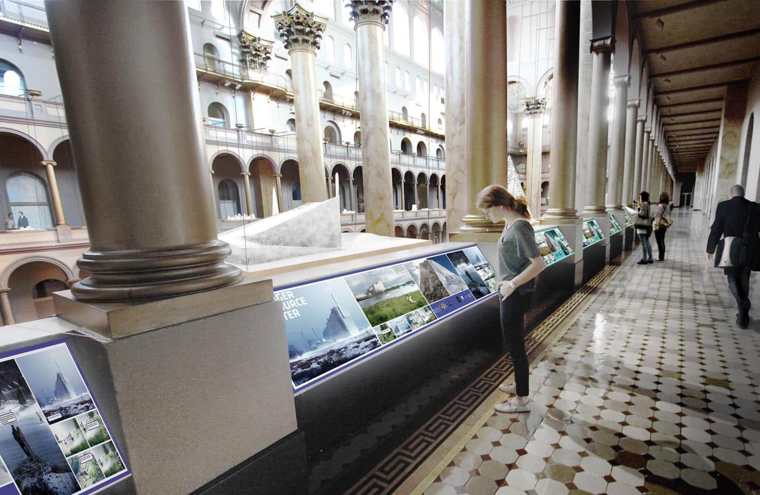 Woman looking at exhibit of photos at the National Building Museum.